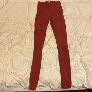 red lululemon yoga pants